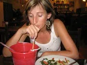 Drinking from a bucket.