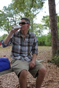 Adam Bartoy sipping on a FLASQ wine
